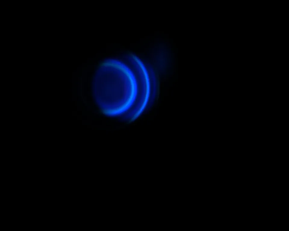 Blue concentric interference rings captured by a CCD after cadmium-lamp light passes through a Fabry-Pérot etalon