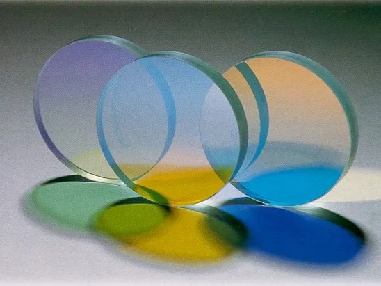 Three interference filters showing different transmitted and reflected colors